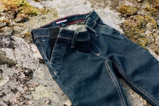 A pair of jeans from Tommy Hilfiger Adaptive designed with innovations that make it more comfortable for seated wear.