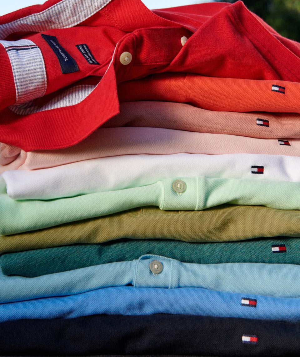 A stack of colorful polos, new for spring from Tommy Hilfiger.