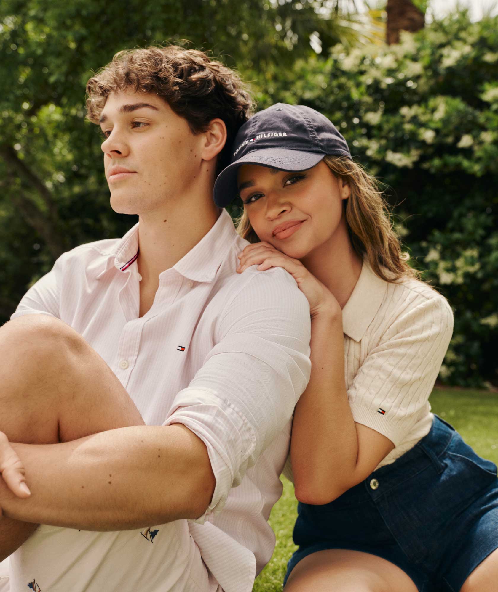 Tik Tok star Noah Beck and actress Madison Bailey wear new summer looks from Tommy Hilfiger.