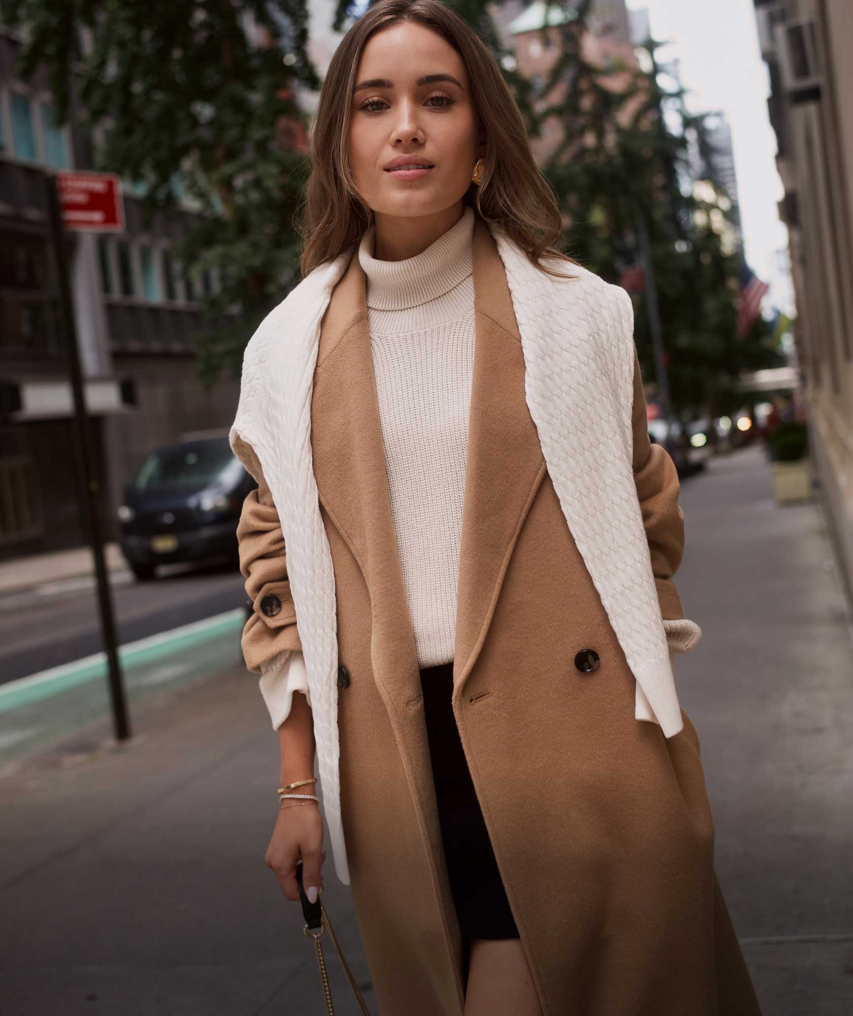 Kate Hutchins walking the street in Tommy Hilfiger jacket