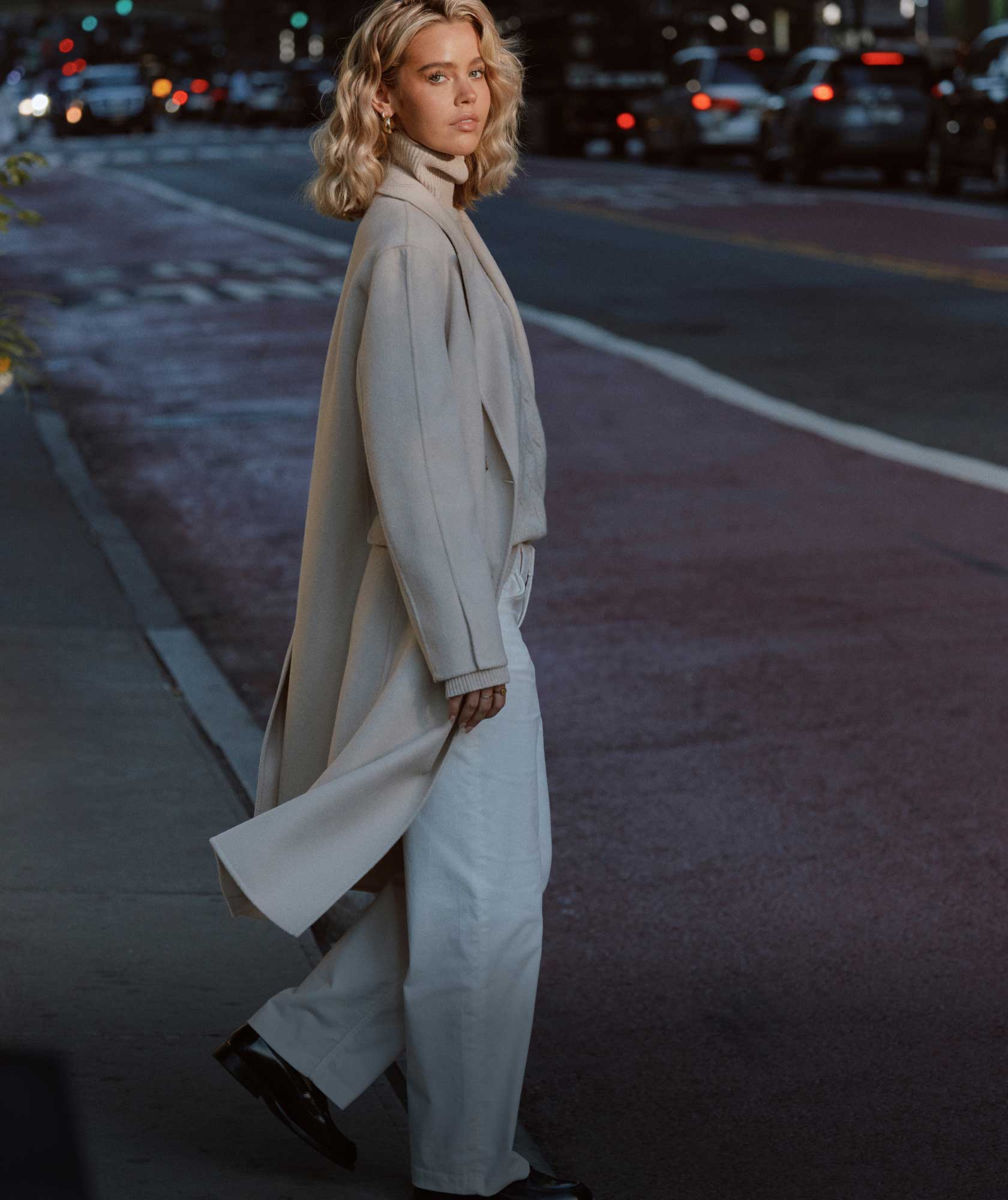 Millane Friesen walking down the street in Tommy Hilfiger double breasted coat