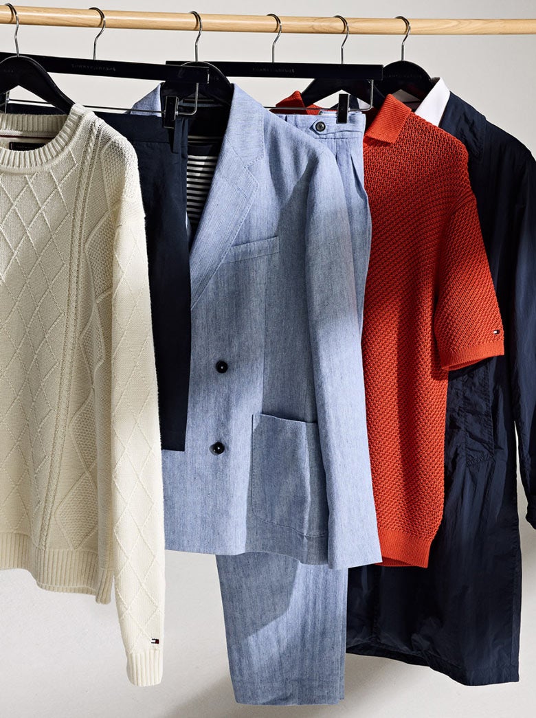 Tommy Hilfiger knitwear and suiting hanging on hangers