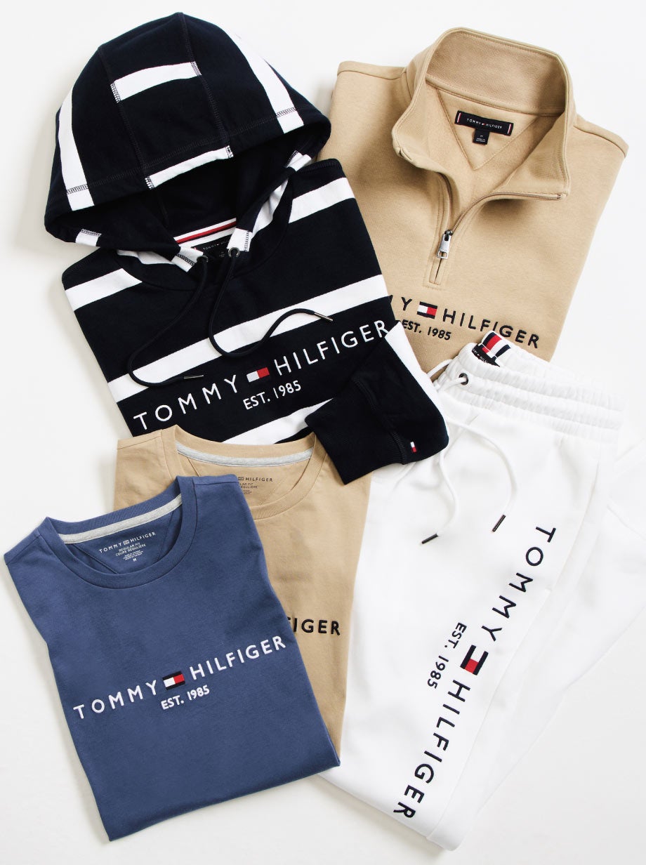 Tommy Hilfiger logo clothing essentials all folded and placed next to each other