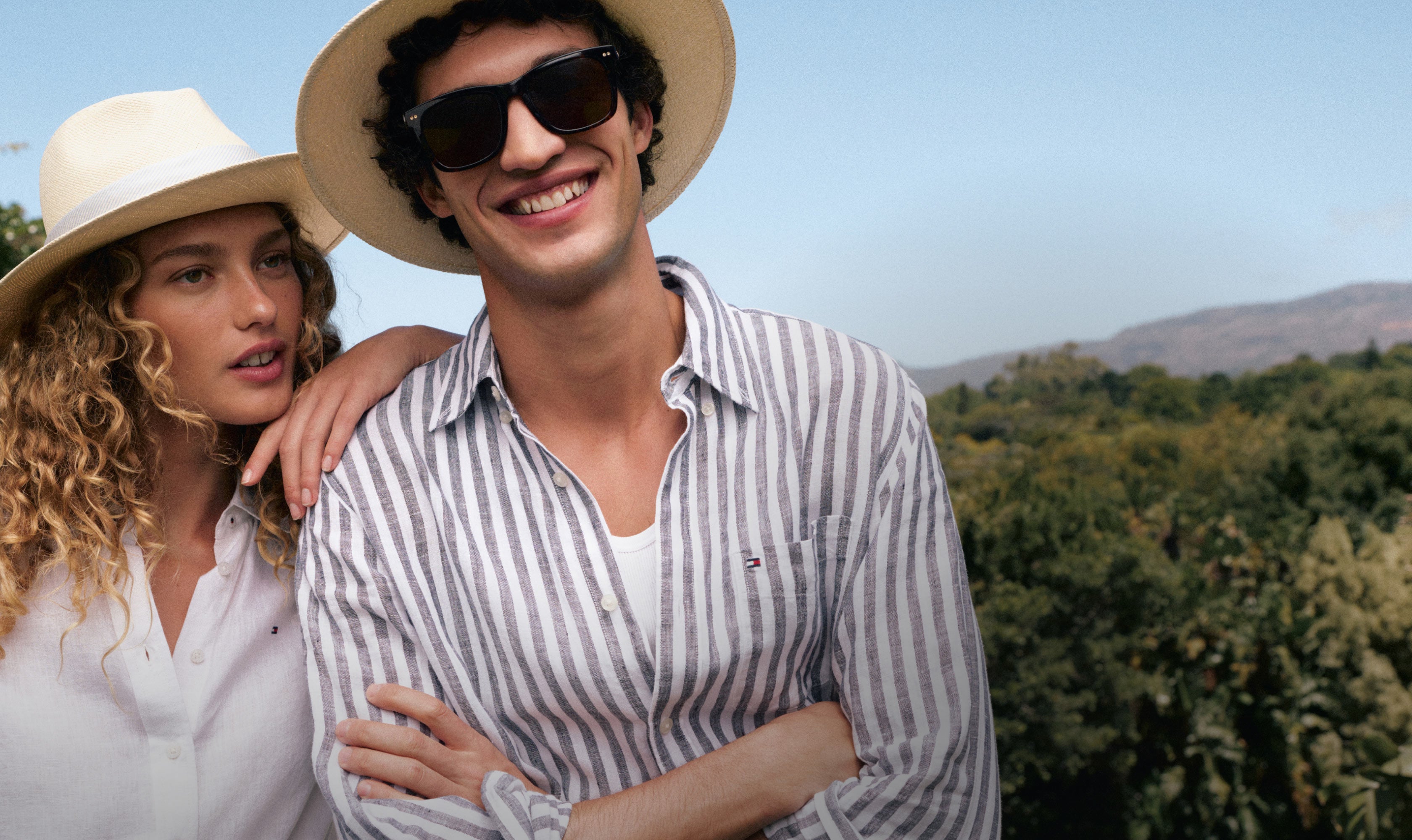 Man and woman staying cool in Tommy Hilfiger linen clothing