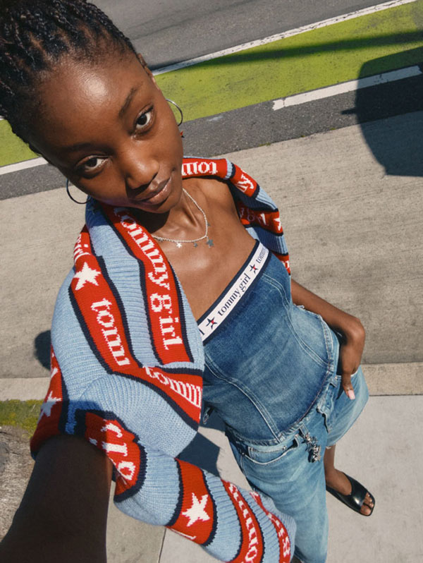 Woman taking selfie wearing Tommy Girl by Tommy Hilfiger outfit