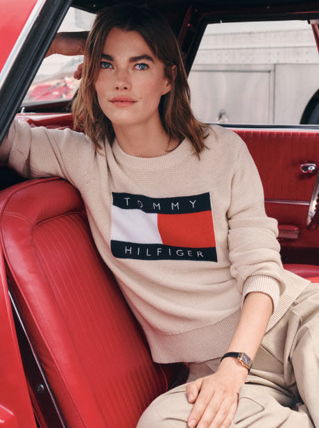 A stack of Tommy logo sweatshirts