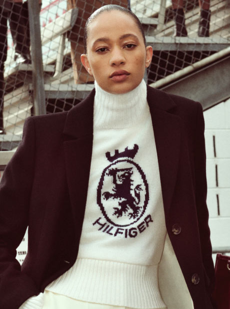 A stack of Tommy logo sweatshirts