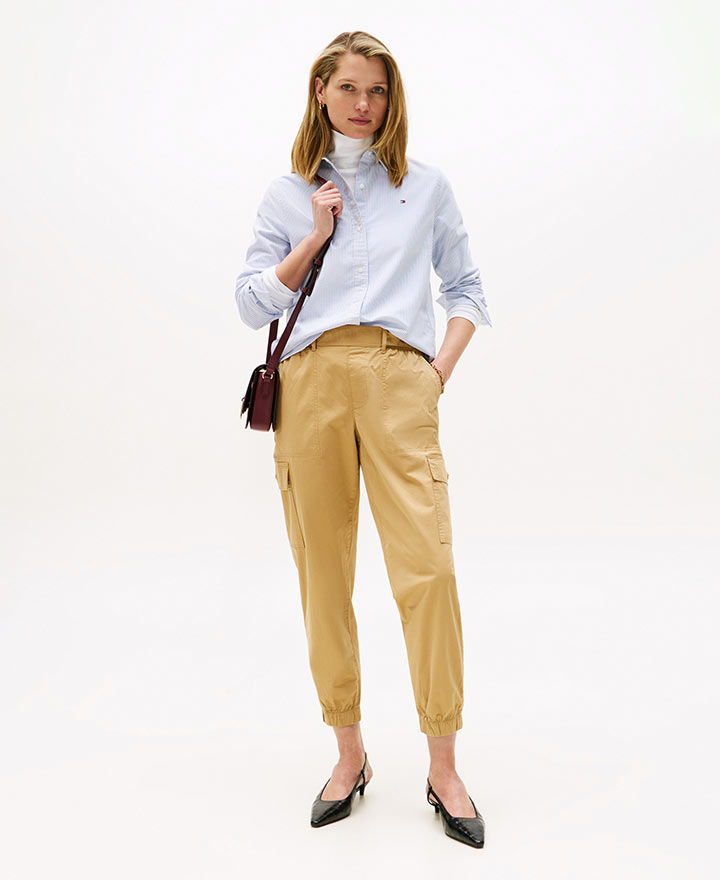 Female model wearing Tommy Hilfiger denim.