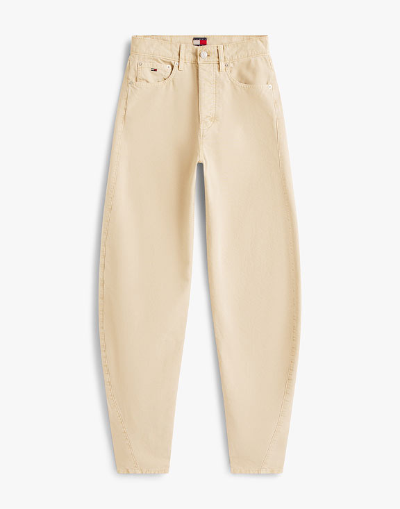 Cream Tommy Jeans joggers with a drawstring waist and small flag logo, flat lay on white.