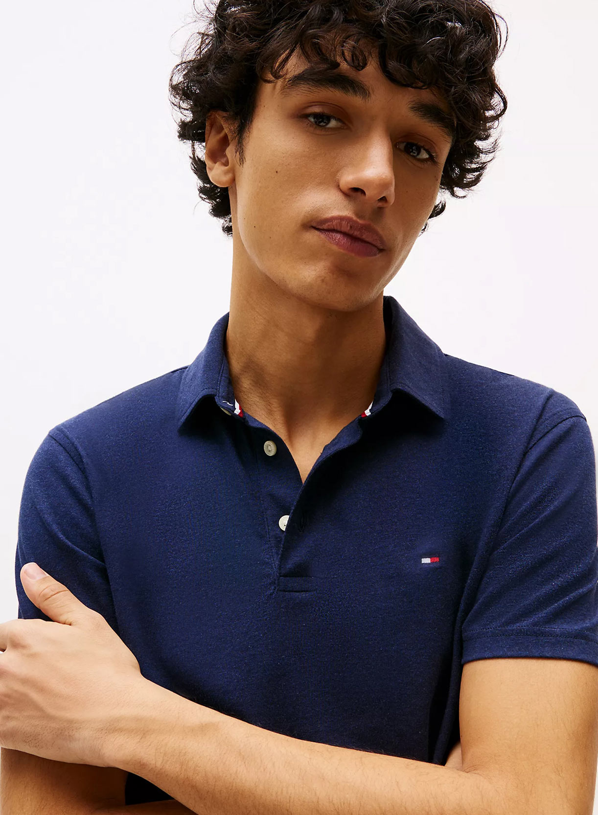 Man in a blue Polo from Tommy Hilfiger.