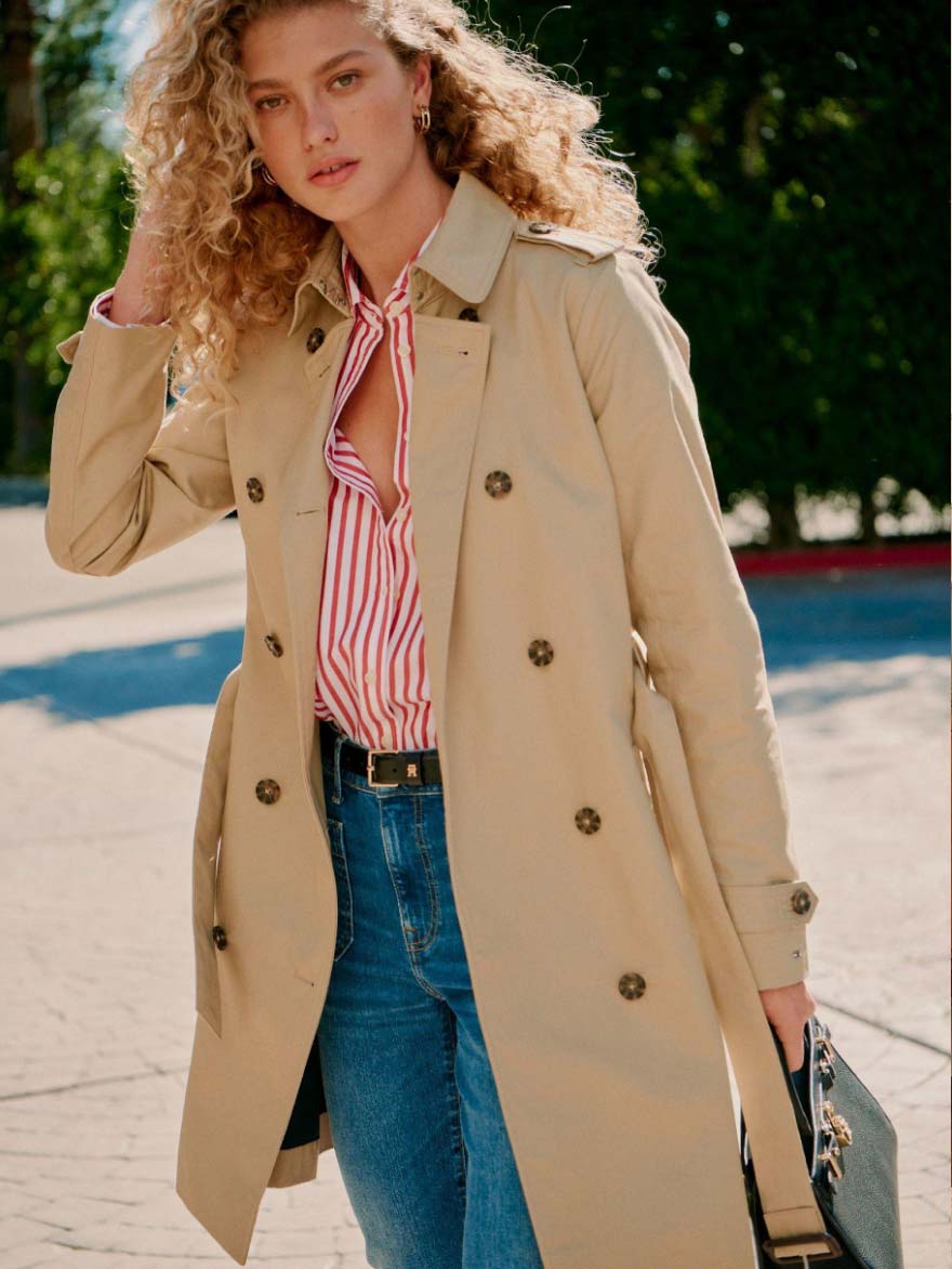 Female model wearing a Tommy Hilfiger Travertine color Trench Coat
