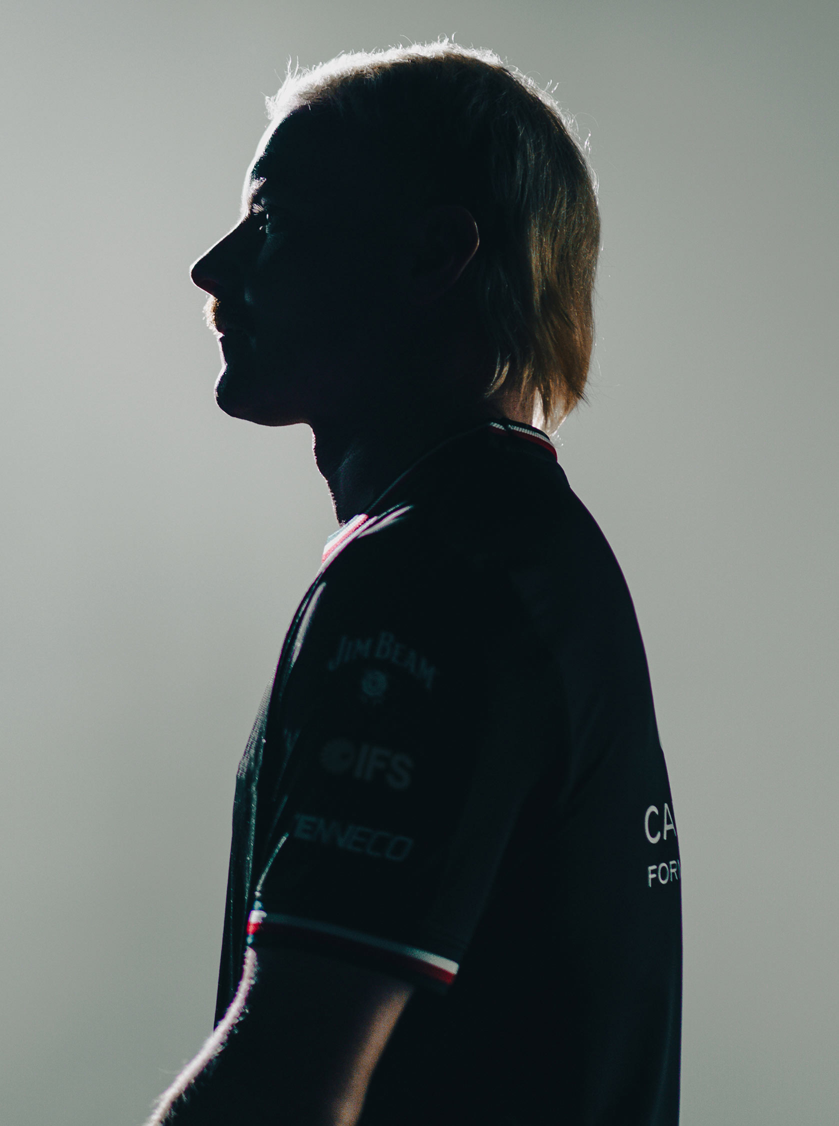 Valtteri Bottas wearing Tommy Hilfiger x Cadillac clothing.