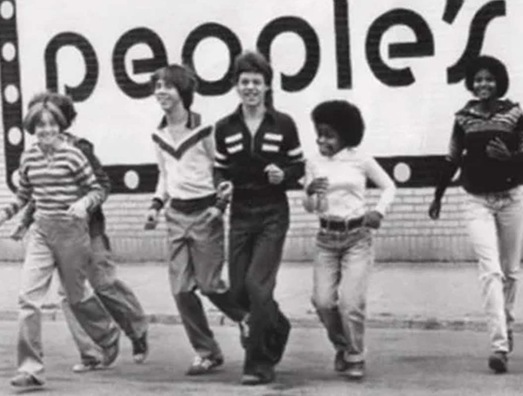 People's Place models running in the street.