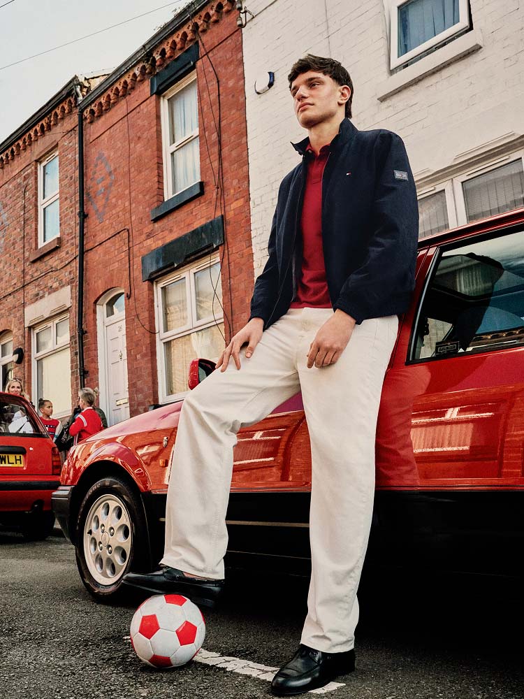 Dominik Szoboszlai and Alexander Isak playing a board game while wearing Tommy Hilfiger.