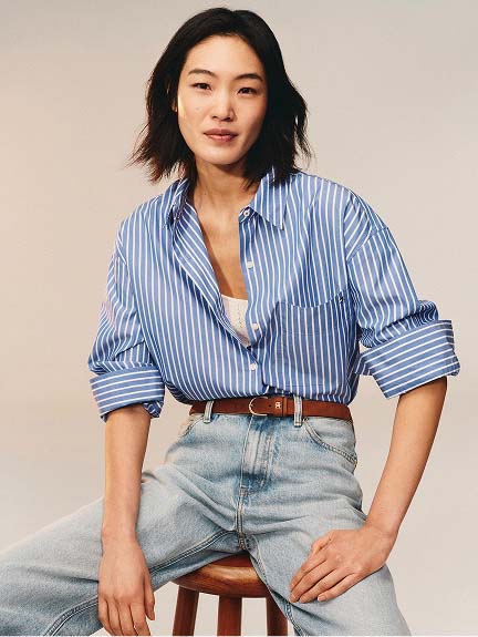 A female model wearing a Tommy Hilfiger outfit