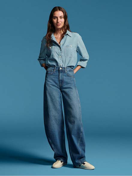 Model wearing a bootcut Tommy Hilfiger Jeans