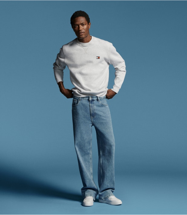 Model wearing a loose Tommy Hilfiger Jeans