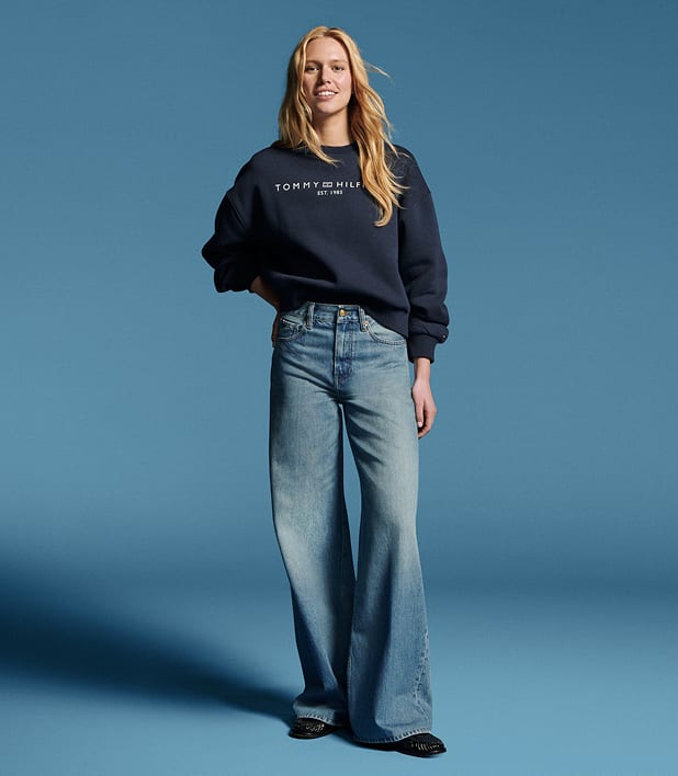 Model wearing a wide leg Tommy Hilfiger Jeans
