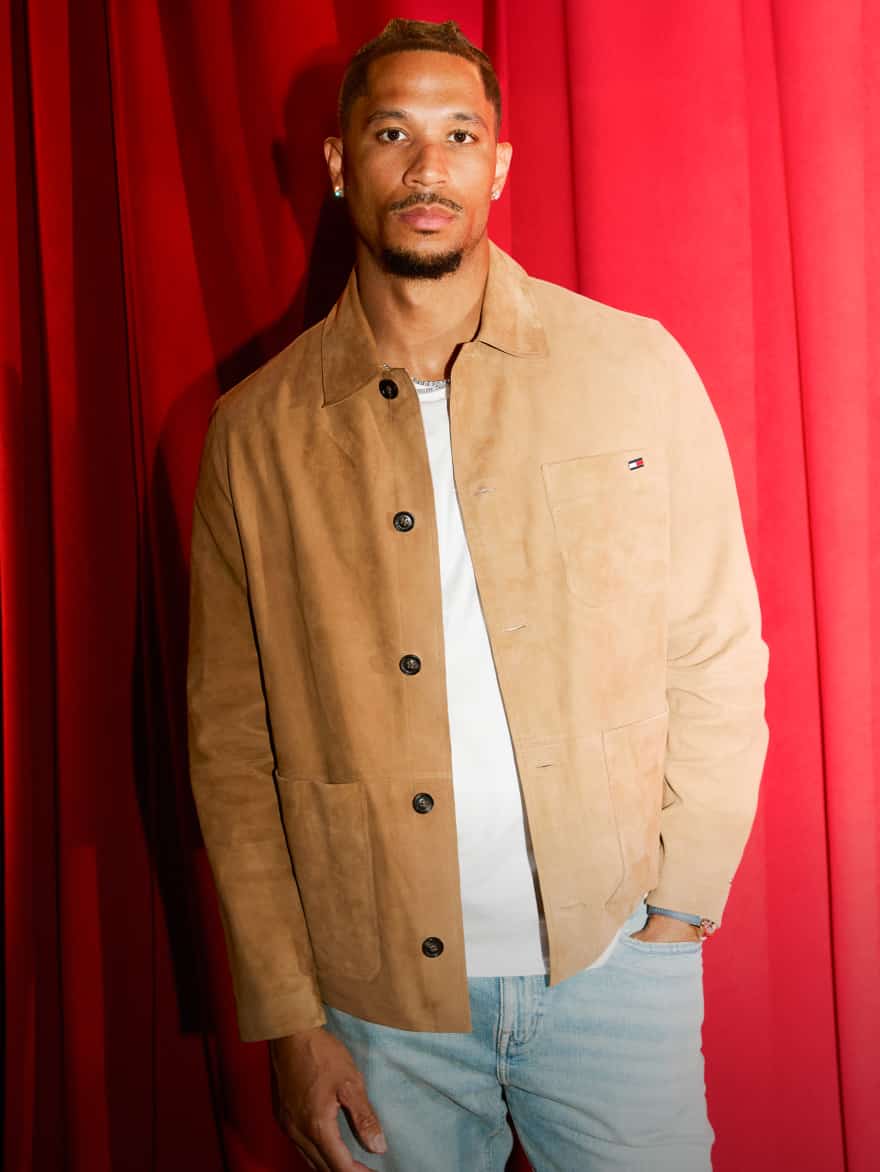 Josh Hart wearing a Tommy Hilfiger outfit.