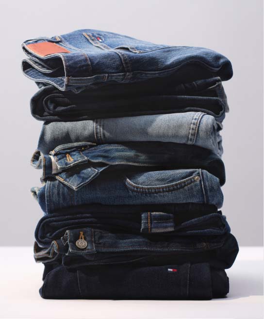 Stack of Tommy Hilfiger folded jeans