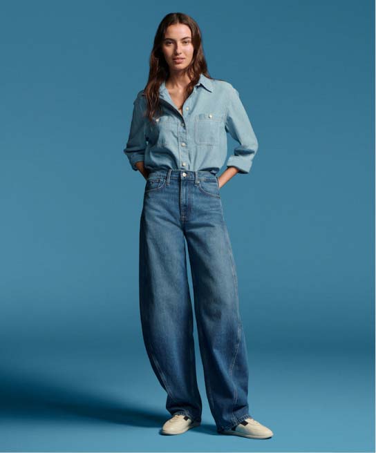 Female model wearing Tommy Hilfiger denim.
