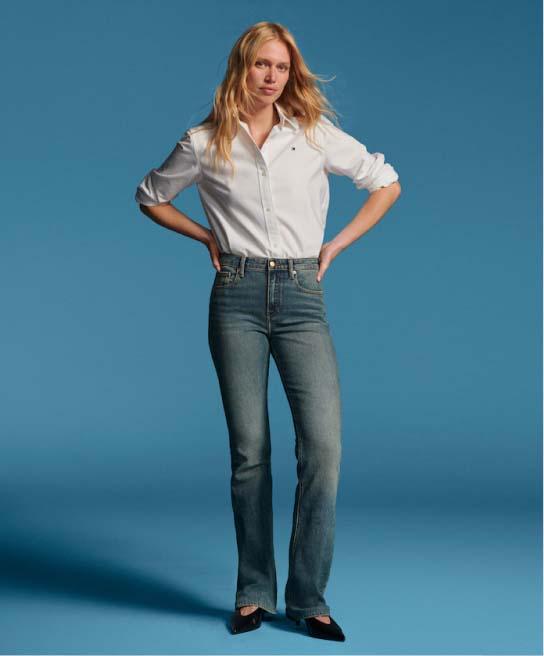 Female model wearing Tommy Hilfiger denim.