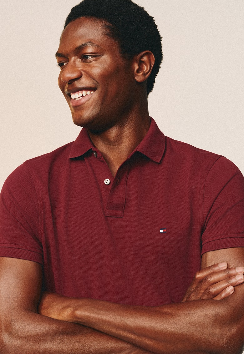 Men wearing a burgundy Tommy Hilfiger Polo.