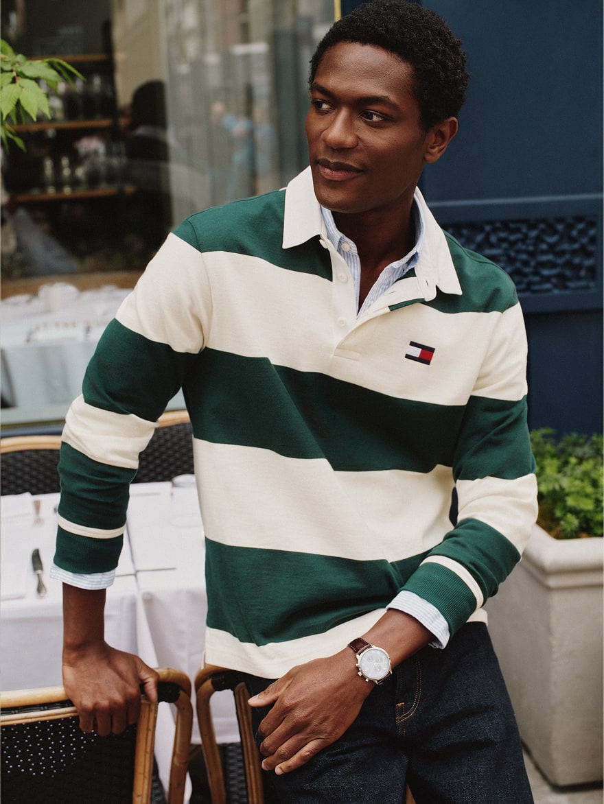 Model wearing a Tommy Hilfiger rugby polo.