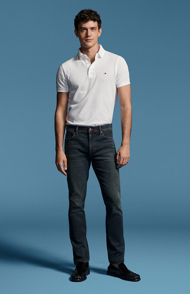 Model in denim wearing Tommy Hilfiger.