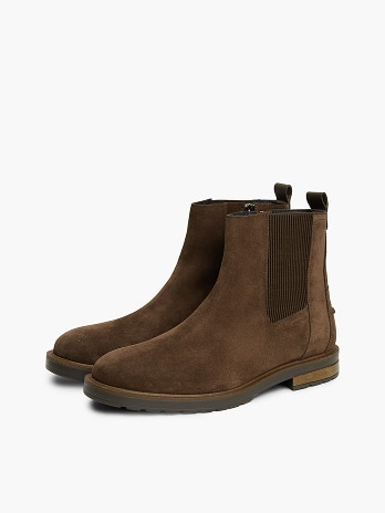 Tommy Hilfiger boots on a white background.