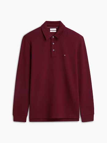 Tommy Hilfiger sweater on a white background.