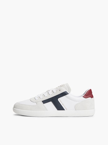 Tommy Hilfiger sneakers on a white background.