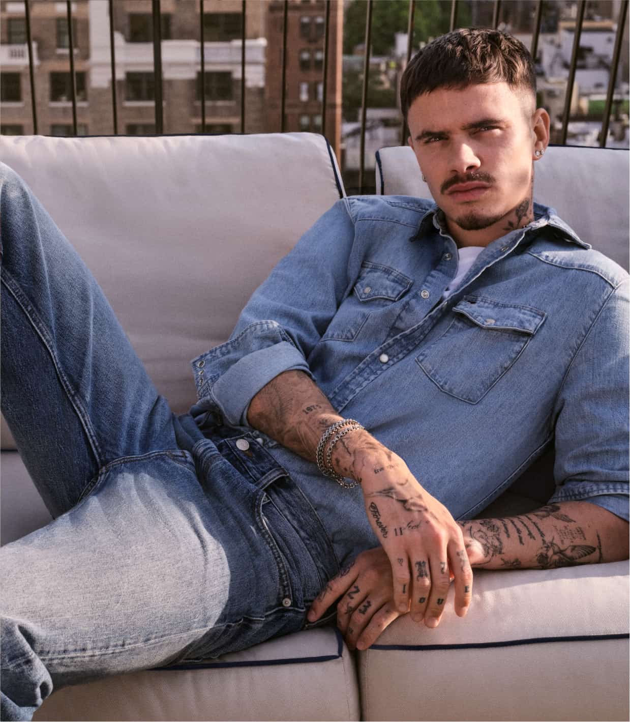 Romeo Beckham wearing all denim Tommy Hilfiger outfits.