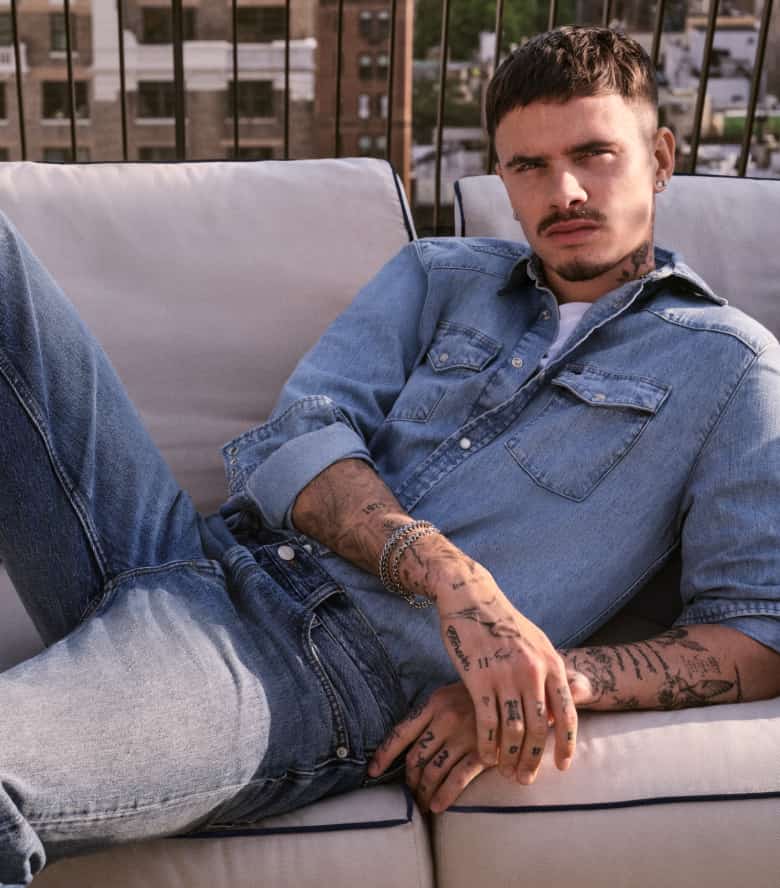 Romeo Beckham wearing all denim Tommy Hilfiger outfits.