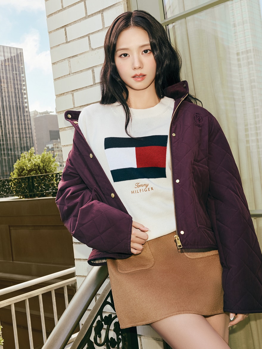 Jisoo wearing a Tommy Hilfiger outfit.