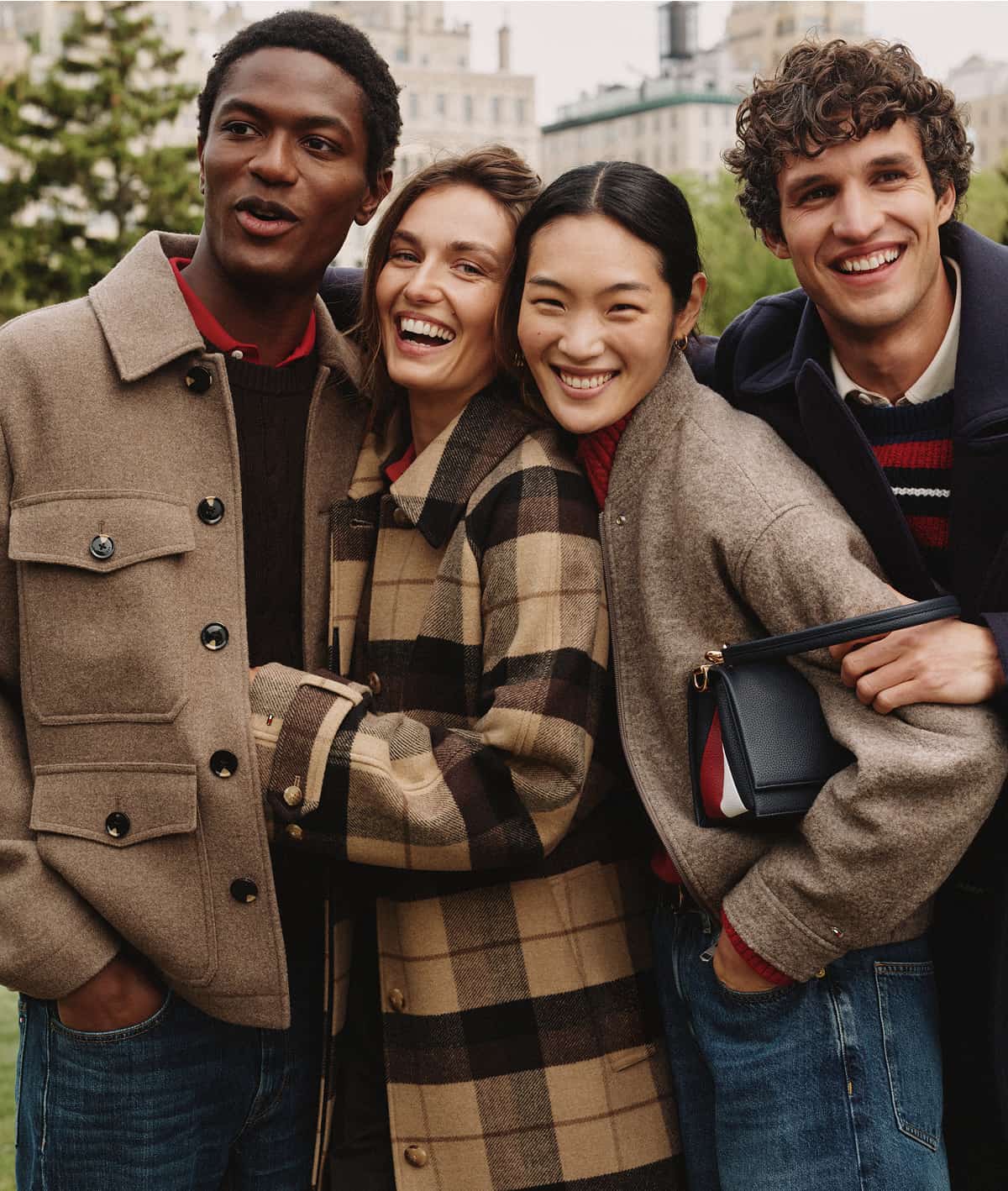 Group of four models wearing Tommy Hilfiger's new collection.