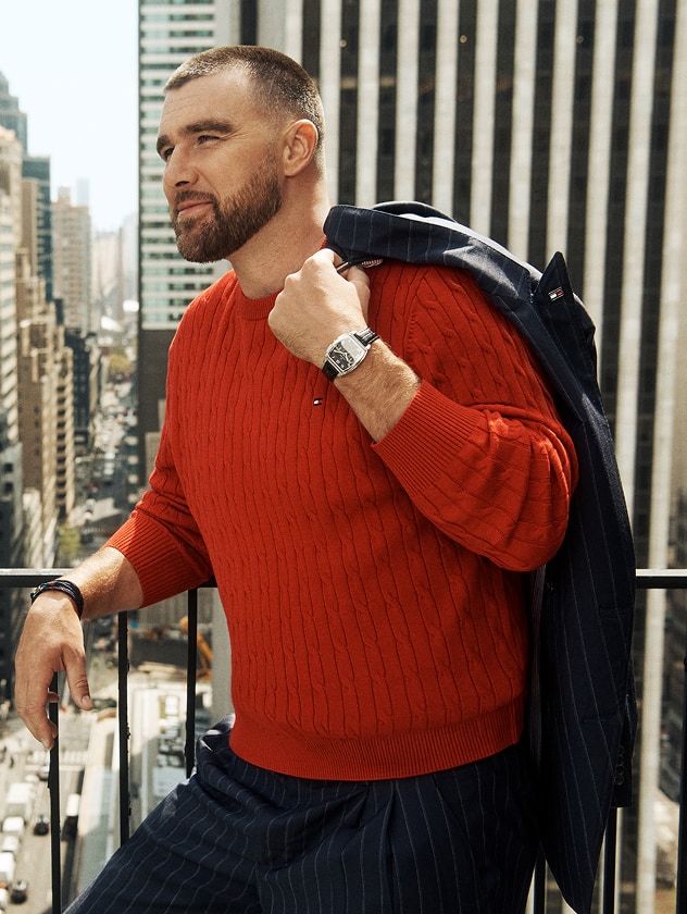 Travis Kelce wearing a long sleeve red cable knit, new from Tommy Hilfiger.