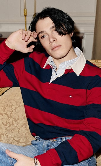 Model wearing a Tommy Hilfiger Polo.