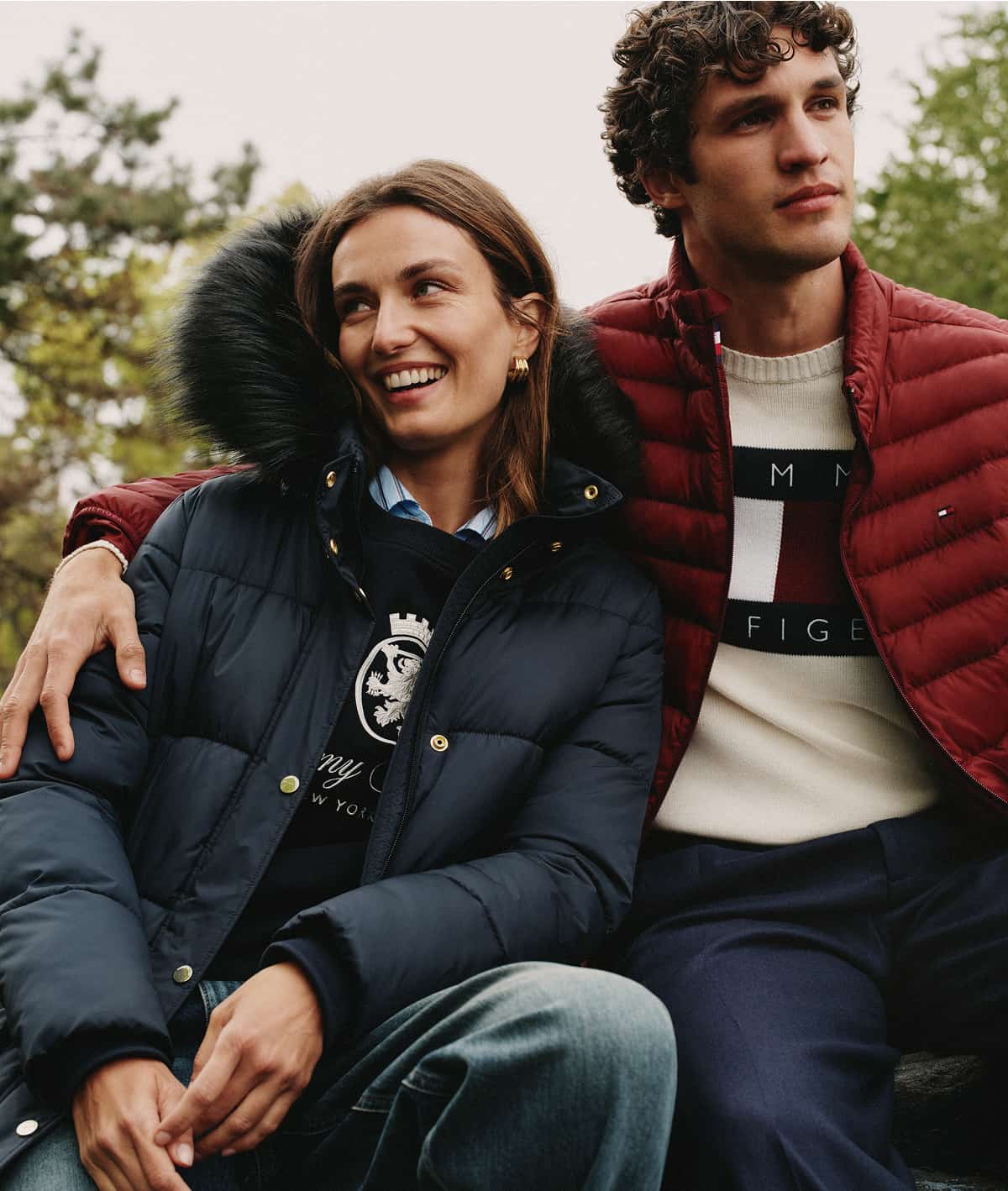 Models wearing Tommy Hilfiger outfits.