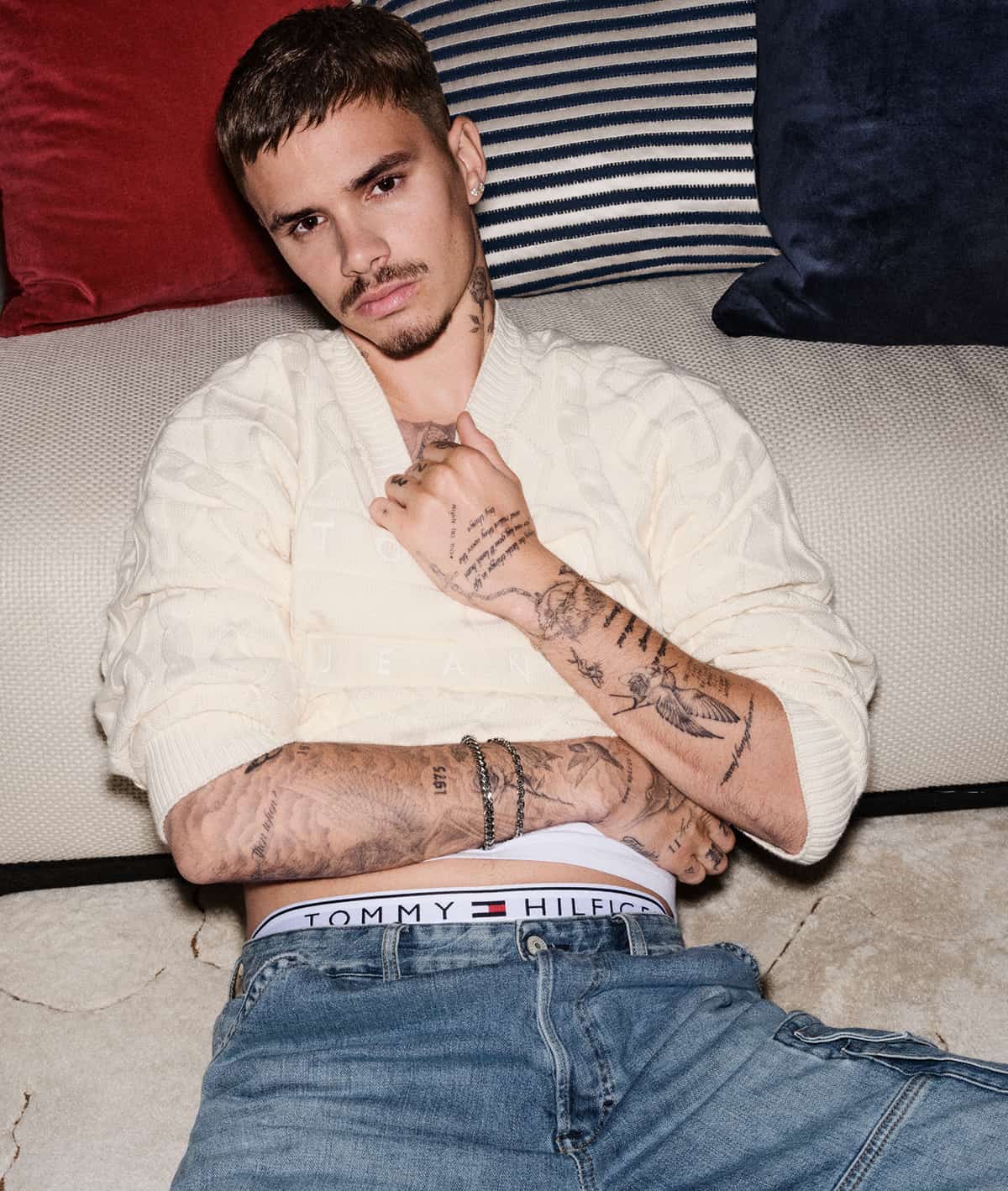 Romeo Beckham wearing Tommy Jeans.
