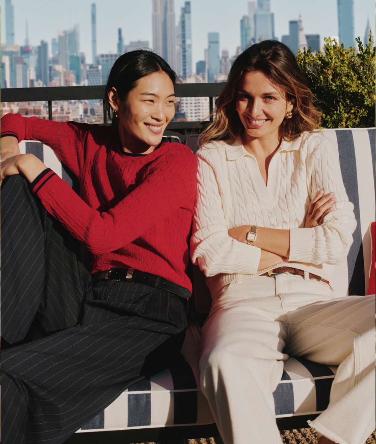 2 Models wearing Tommy Hilfiger sweaters.