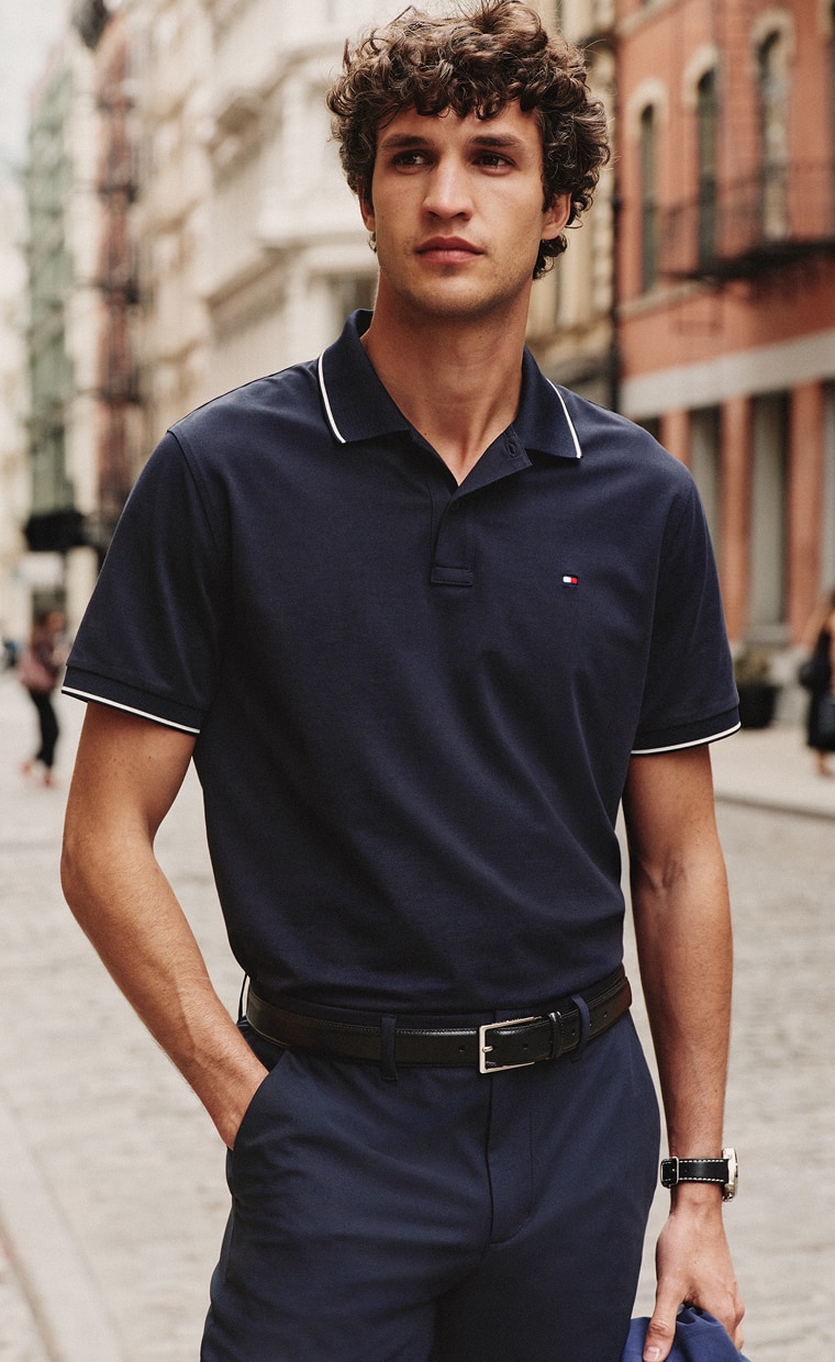 Model wearing a TH Performance Tommy Hilfiger Polo.