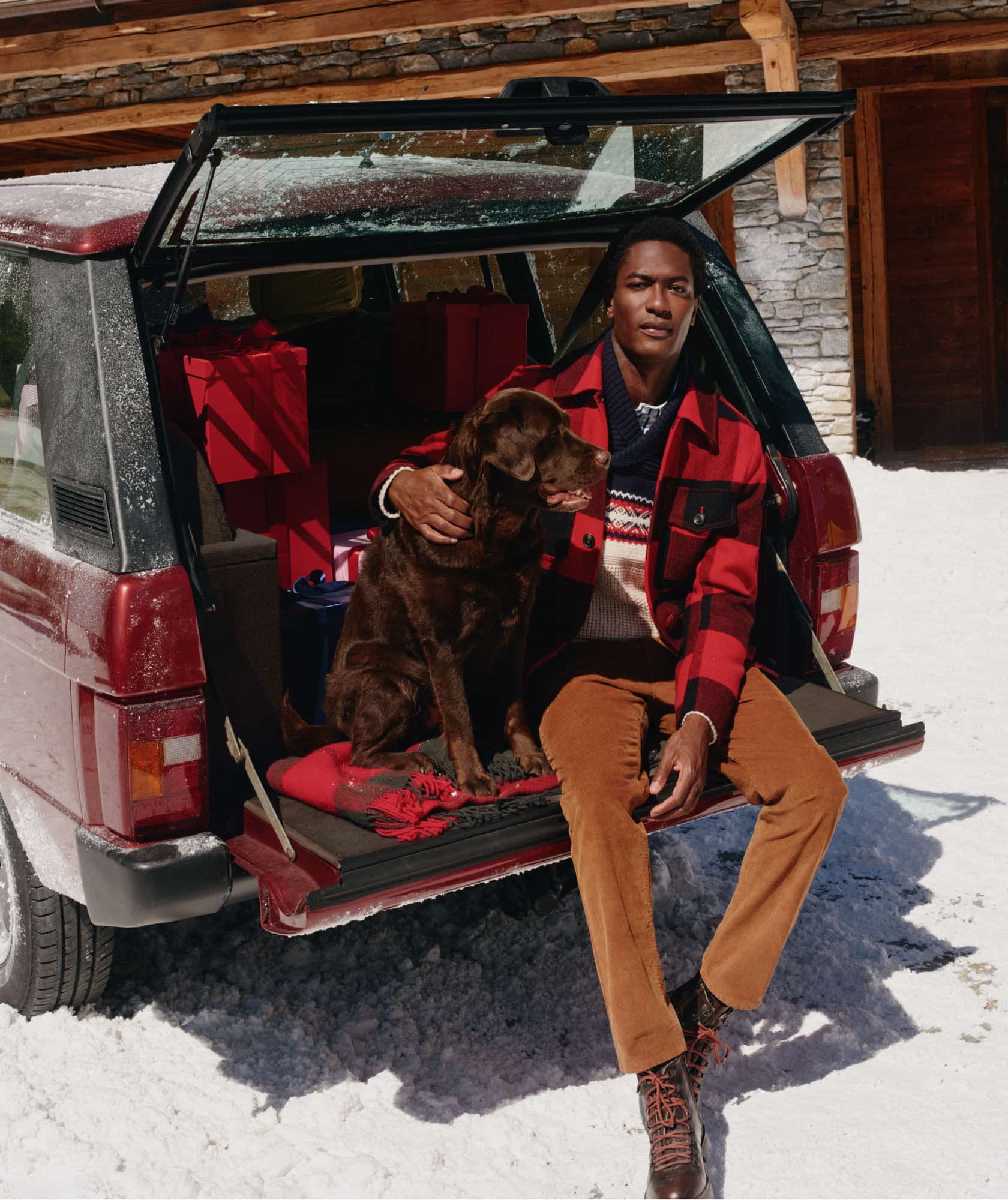 Model wearing Tommy Hilfger festive outfit.